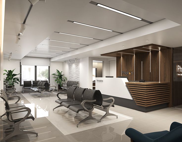 Recepcao e sala de atendimento de uma clinica medica premium com luz natural